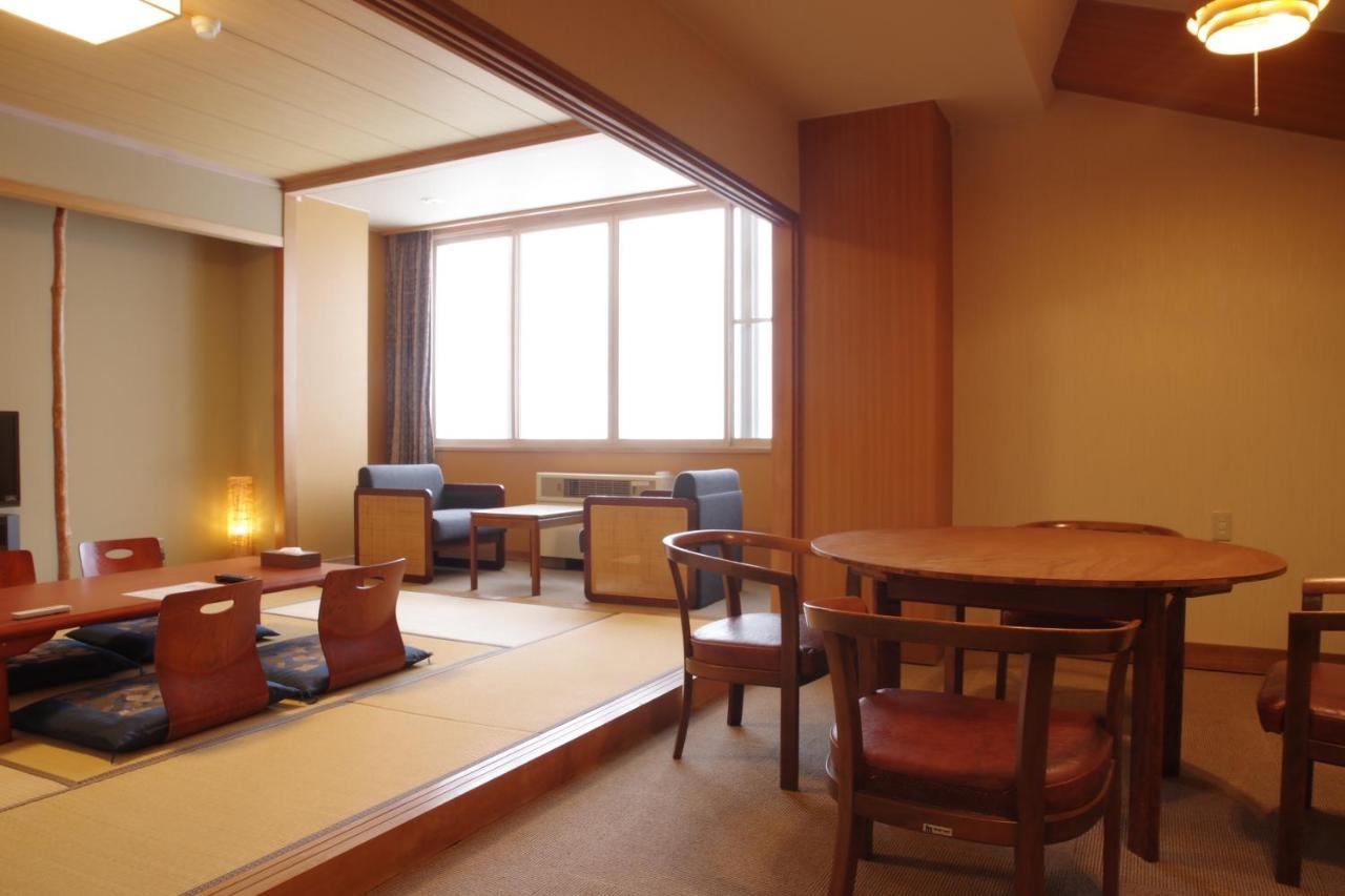 Higashikawa K'S House Hokkaido - Asahidake Onsen Hostel מראה חיצוני תמונה