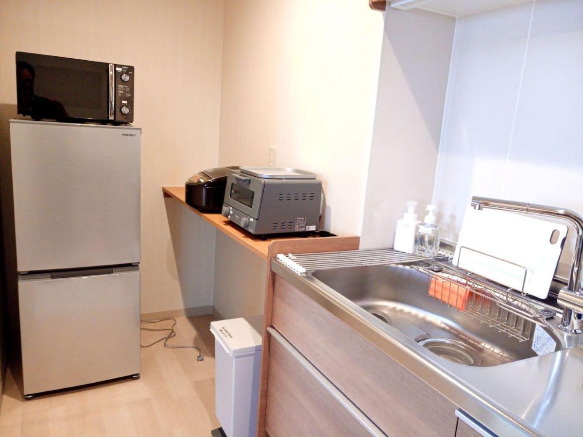 Higashikawa K'S House Hokkaido - Asahidake Onsen Hostel מראה חיצוני תמונה