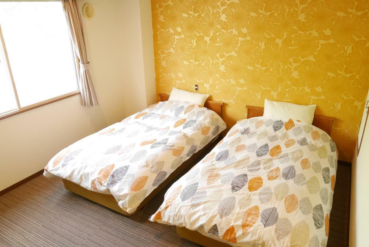Higashikawa K'S House Hokkaido - Asahidake Onsen Hostel מראה חיצוני תמונה