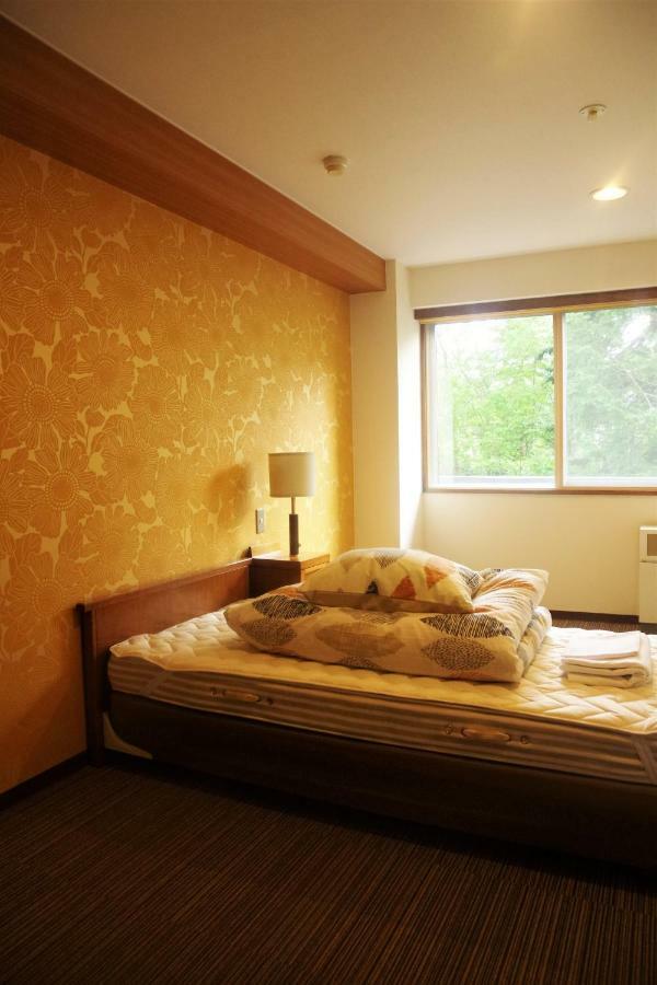 Higashikawa K'S House Hokkaido - Asahidake Onsen Hostel מראה חיצוני תמונה