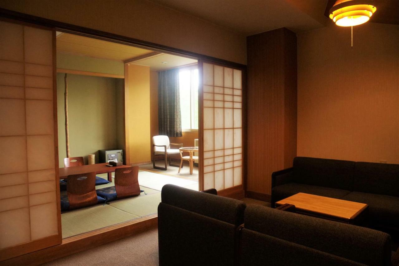 Higashikawa K'S House Hokkaido - Asahidake Onsen Hostel מראה חיצוני תמונה