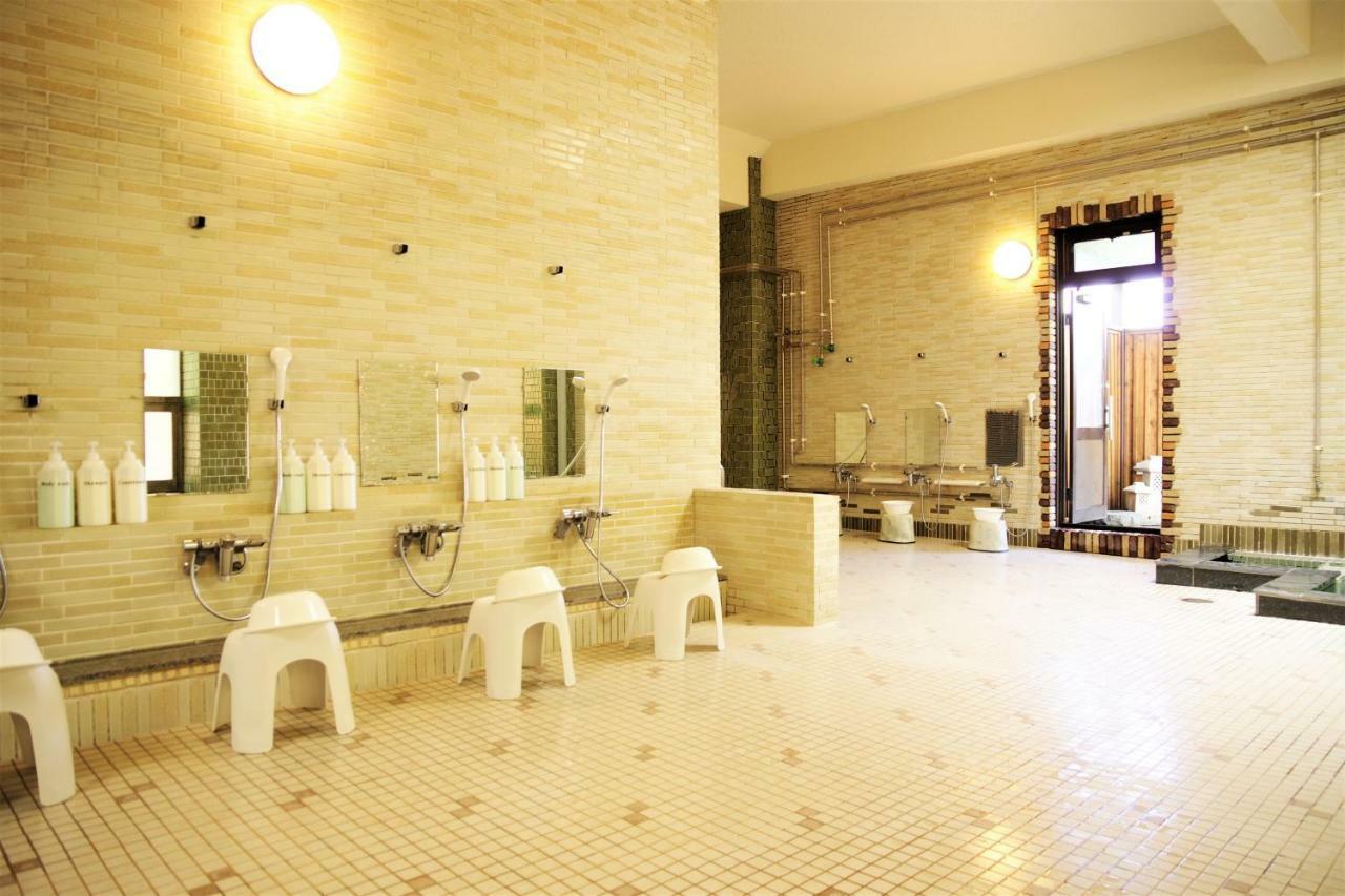 Higashikawa K'S House Hokkaido - Asahidake Onsen Hostel מראה חיצוני תמונה