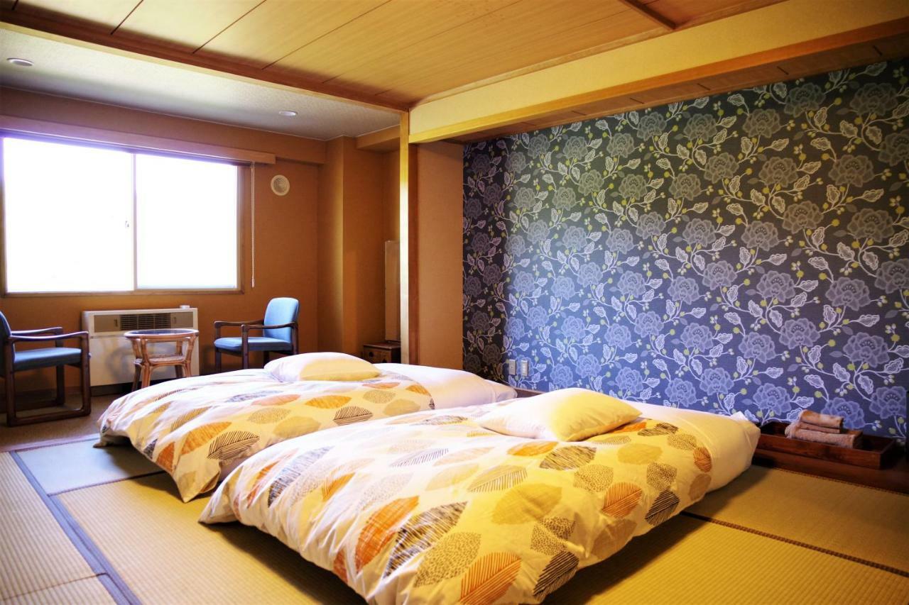 Higashikawa K'S House Hokkaido - Asahidake Onsen Hostel מראה חיצוני תמונה